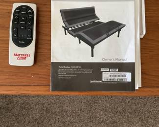 Remote and owner’s manual for Queen adjustable bed.