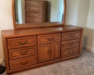 Dresser with mirror. Height 72 inches, length 67 inches, depth 19 inches.