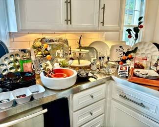 BEAUTIFUL PEWTER, WHITE DISHWARE, POPS OF ORANGE.