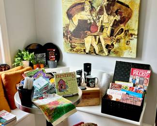 BREAKFAST AREA WITH LOTS OF COOKBOOKS, ART, DECOR. ROUND TABLE NOT FOR SALE.