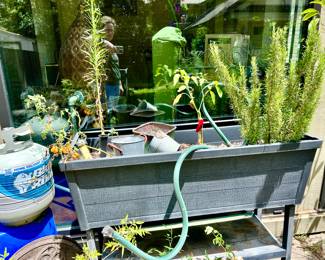 OUTDOOR RAISED PLANTER.