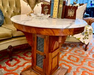 LOVE THIS ANTIQUE MARBLE TOP TABLE WITH GLASS DOOR.