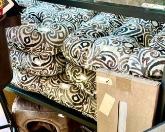 LOTS OF PATIO FURNITURE CUSHIONS- LIKE NEW IN THIS PATIO CABINET.