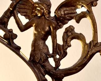 ANTIQUE LAMP DETAIL.