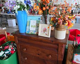 Dresser with Floral Arrangements