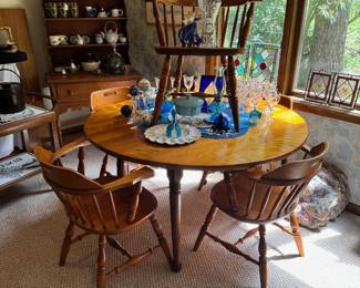 c.1950's Solid Maple Table with 4 Leaves and 6 Chairs, so it can be made into a large oval table OR a smaller round table (Shown with 2 leaves inserted)