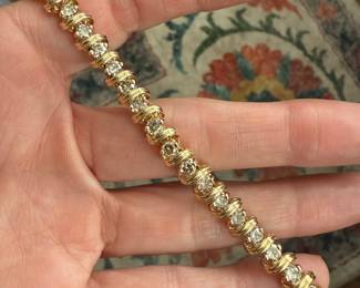 14kt 5ctw diamond tennis bracelet. 7”