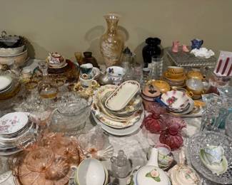 Table full of Vintage and Antique Glassware