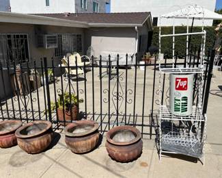 There are a few pots for plants. And then there is the classic 7-Up container.