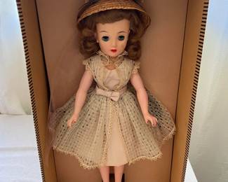 There are dolls available in the sale, and this is one of them. Folks with more knowledge of vintage dolls can determine if this is the Revlon doll or not.