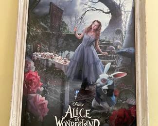 This poster of Disney's Alice in Wonderland is signed.