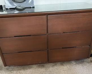 For a bit of style, you can't go wrong with this six-drawered dresser.