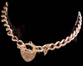 Gold Curb Bracelet With Heart Shaped Padlock Clasp