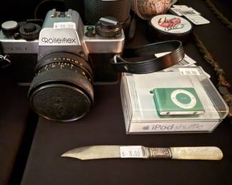 Niklas Lidstrom Signed Puck, Ipod Shuffle, Rolleiflex, Letter Opener