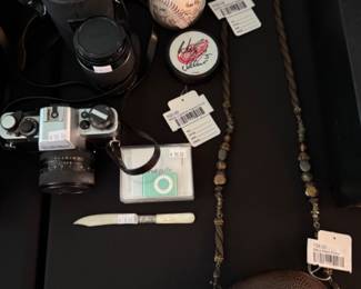 Maya Resin Purse, Niklas Lidstrom Signed Puck, Ipod Shuffle, Rolleiflex, Letter Opener, Sparky Anderson Signed Ball
