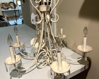 Shabby Chic I'd say! This is so cool...you need this lovely Chandalier!
