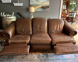 Double reclining leather couch with hobnail trim...SO comfy and good looking!