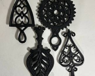 Four Cast Iron Trivets