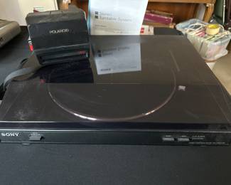Vintage Polaroid Camera and SONY Turntable