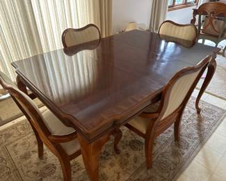 Dining table, (4) chairs, and pads