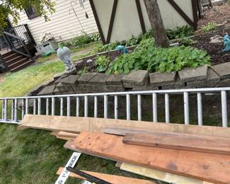 Large Extension Ladder and Scrap Wood