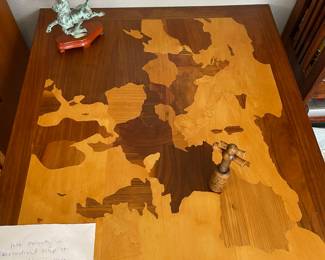 This is a marquetry map of aeronautical map of Europe - beautiful - hand made - can be a wall hanging, a table or a bar height table.