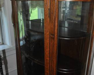 Curved china cabinet