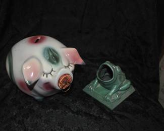 Piggy bank and metal frog 