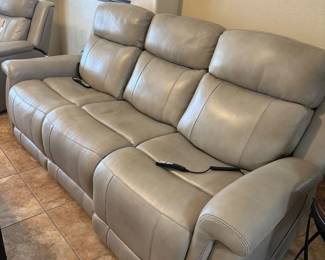 Living Spaces reclining sofa with power headrest heat and massage. Purchased 6/17/21