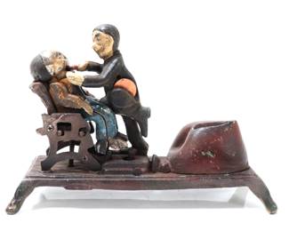 Lot 486 Cast Iron Mechanical Bank, Dentist