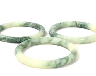 Lot 125 Group of Three Chinese Marbled Green Bangles