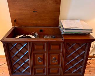 What we have is a Genuine Zenith Mono/Stereo Cabinet thet is in a Working Condition.  Radio Sounds Great on WXRT and  Phono does rotate,