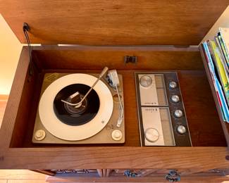 What we have is a Genuine Zenith Mono/Stereo Cabinet thet is in a Working Condition.  Radio Sounds Great on WXRT and  Phono does rotate,