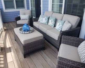 Woven all-weather wicker patio conversation set by Agio