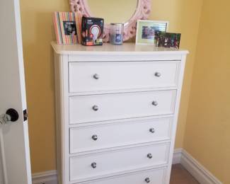 Tall 5-drawer dresser; pink wall mirror