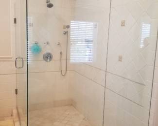 Glass shower surround; shower hardware