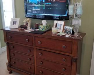 King bedroom set: 8-drawer dresser; flat screen TV with mounting bracket