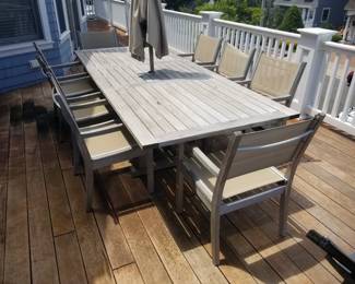 Teak patio dining sets by Gloster seats 8