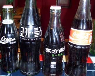 CHINESE AND KOREAN FILLED COKE BOTTLES