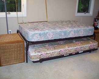 TRUNDLE BEDS WITH GREAT SHAPE MATTRESSES - PAIR OF WICKER TRUNKS
