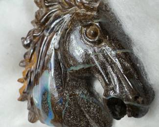 Pure boulder opal carved horse head 