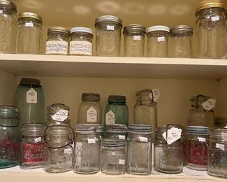 Antique jars, some with zinc lids