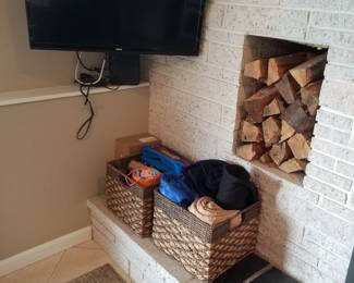 Storage baskets; flat screen TV with mounting bracket