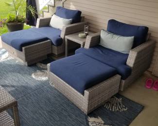 All weather wicker chairs & ottomans; outdoor rug