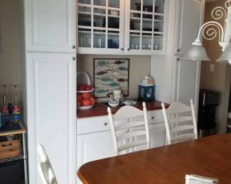 Storage hutch with pantry and glass front cupboards