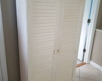 Tall storage cupboard