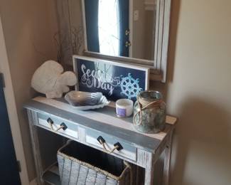 Rustic foyer table; wall mirror; nautical decor