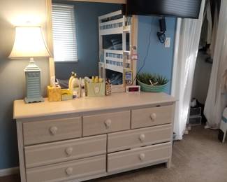 7-drawer dresser with mirror; flat screen TV with mounting bracket; table lamp