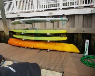 Tow man kayak; surfboards (paddles available). Please note, surfboard rack is not for sale