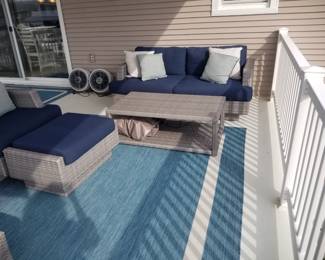 All weather wicker patio conversation set; outdoor rug